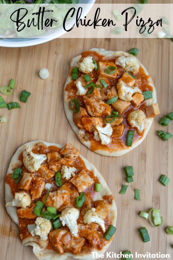 butter chicken pizza on naan topped with cauliflower and green onion