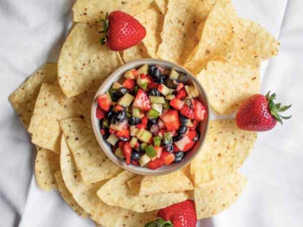 berry salsa in bowl with chips