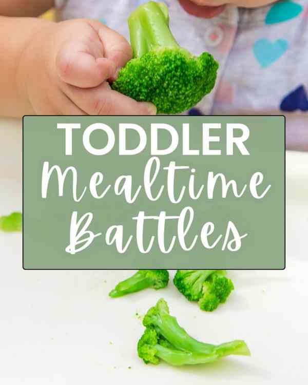 toddler eating broccoli