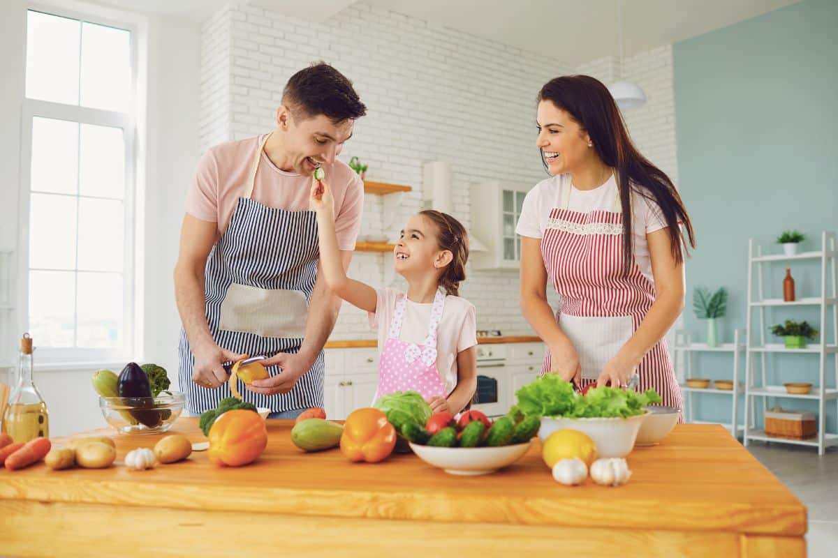 parents cooking vegetarian lunch ideas with child